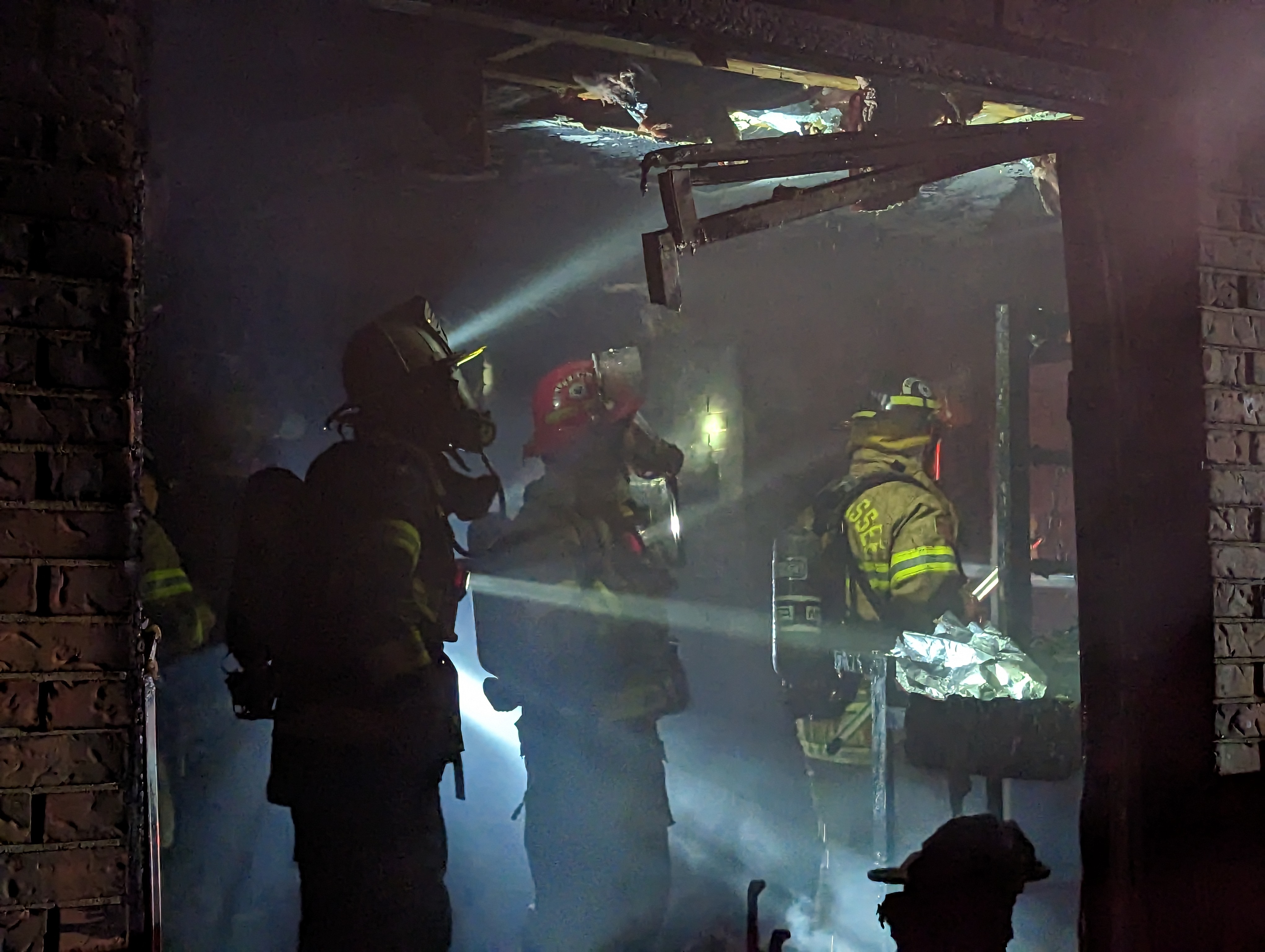 Firemen in a building