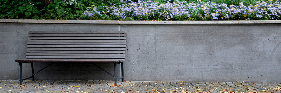 A bench along a retaining wall