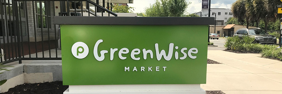 A sign for Greenwise Market